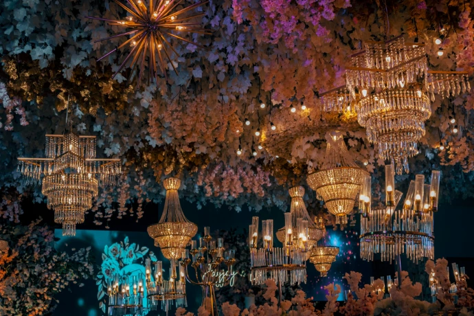 a building with chandeliers and flowers on the ceiling
